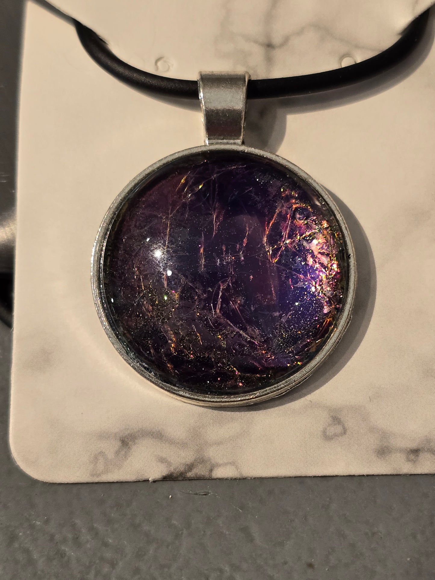 Pendant with black faux leather purple charm