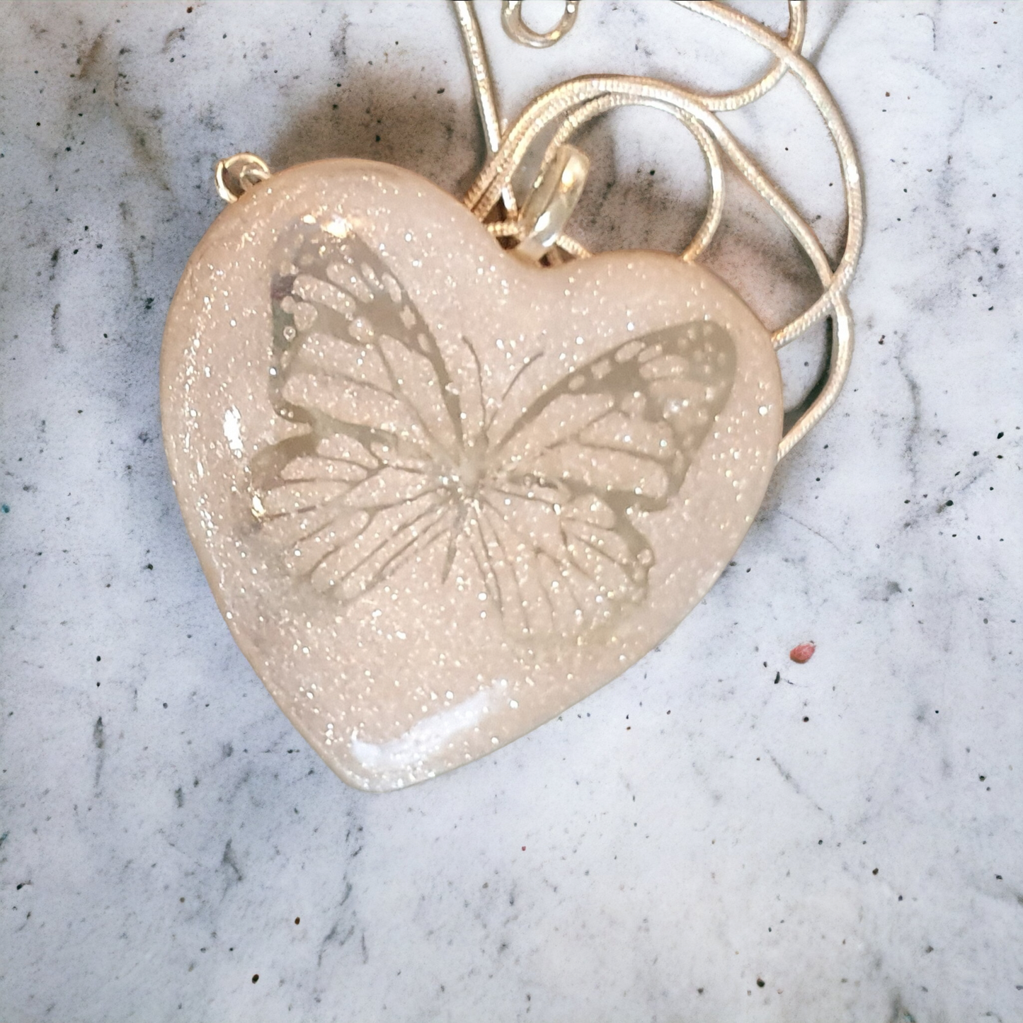 Pendant love heart white shimmer with silver butterfly 🦋