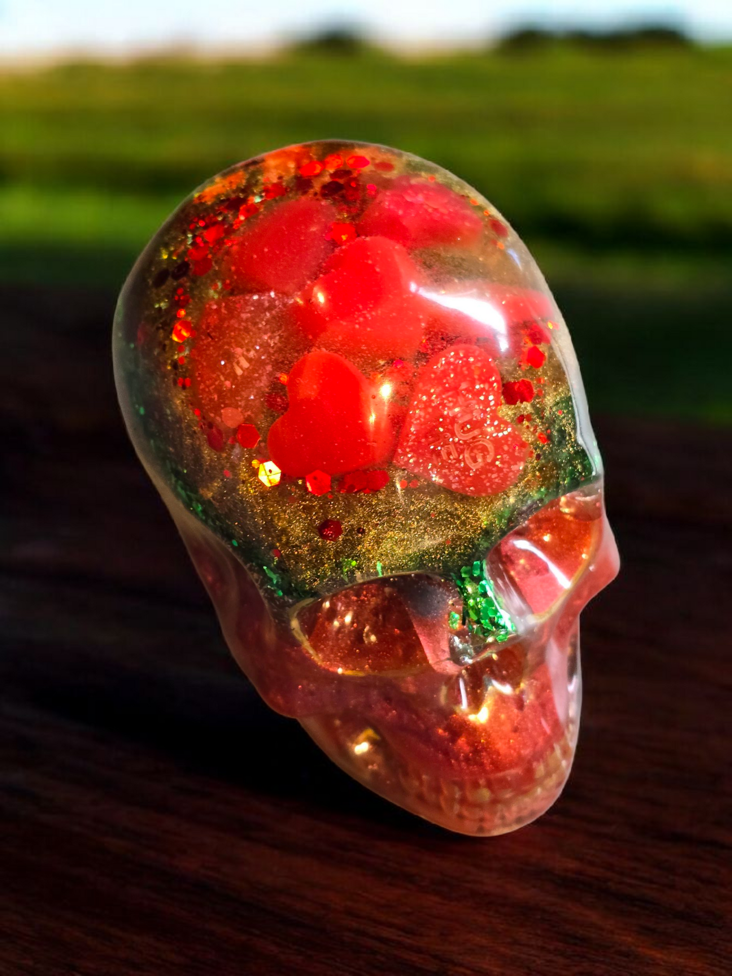 Scull with red hearts